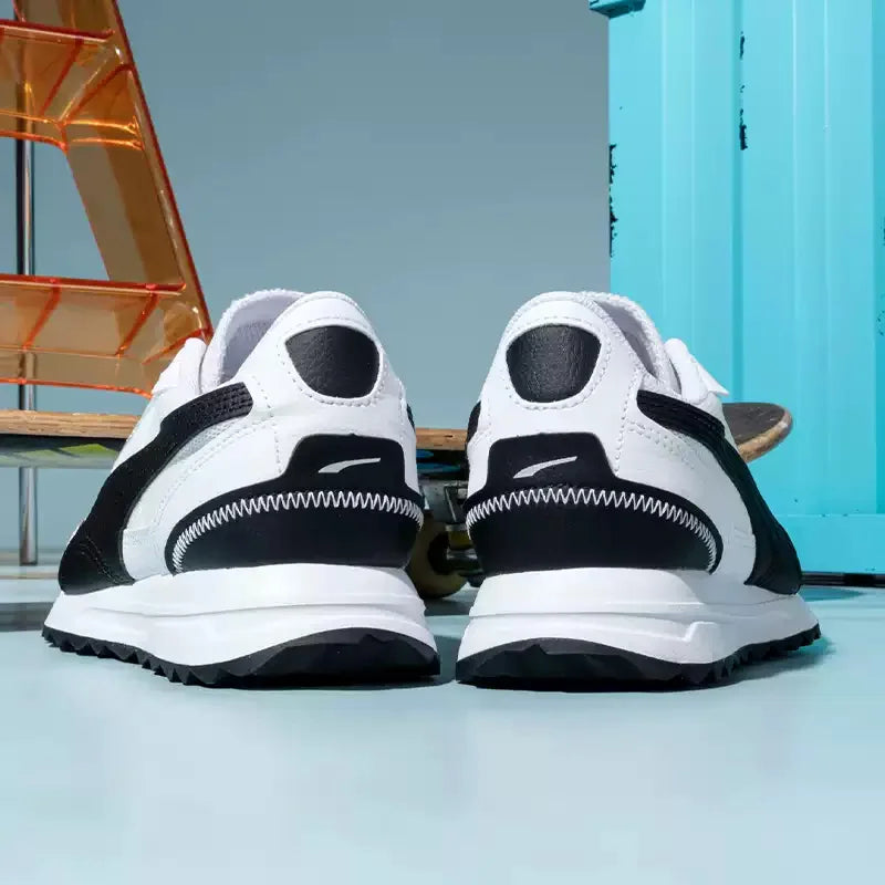 PUMA Baskets de course décontractées rétro légères en maille respirante blanches et noires antidérapantes 397432-05