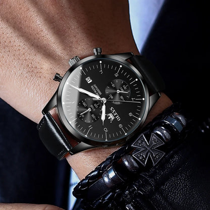 Orologio da uomo OLEVS 2880 – Cronografo elegante e dalle linee essenziali, cinturino in pelle, datario automatico, impermeabile, lancette luminescenti, movimento al quarzo.