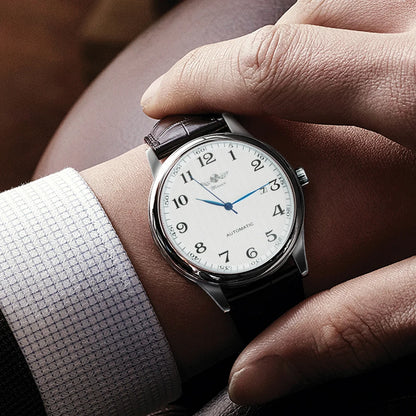 Orologio da uomo WINNER – Stile classico, retrò ed elegante – Orologio meccanico a carica automatica con calendario – Marchio di lusso, cassa in acciaio e cinturino in pelle